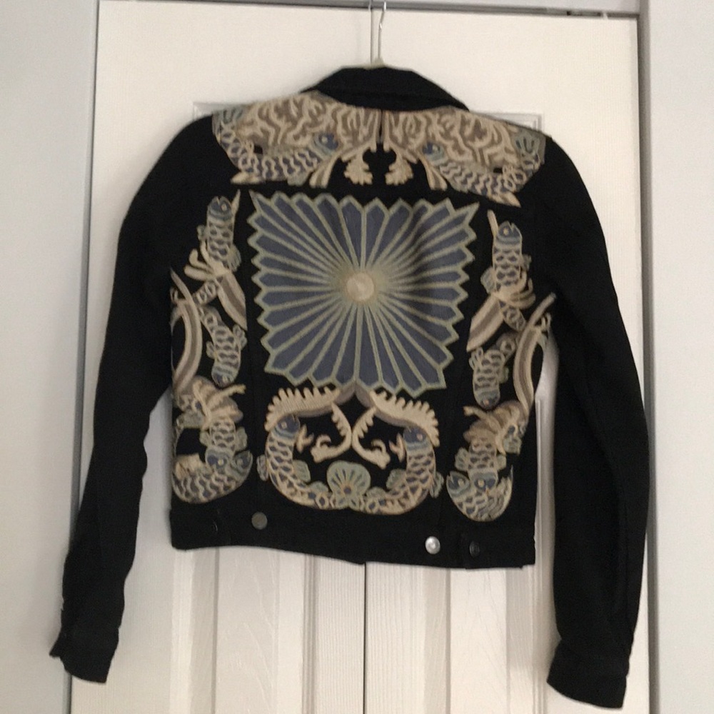 H&M black denim jacket w/ embroidery on the back.